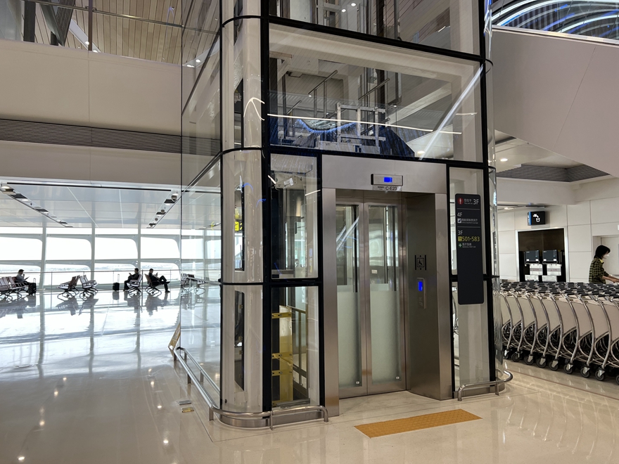 Glass elevator in mall
