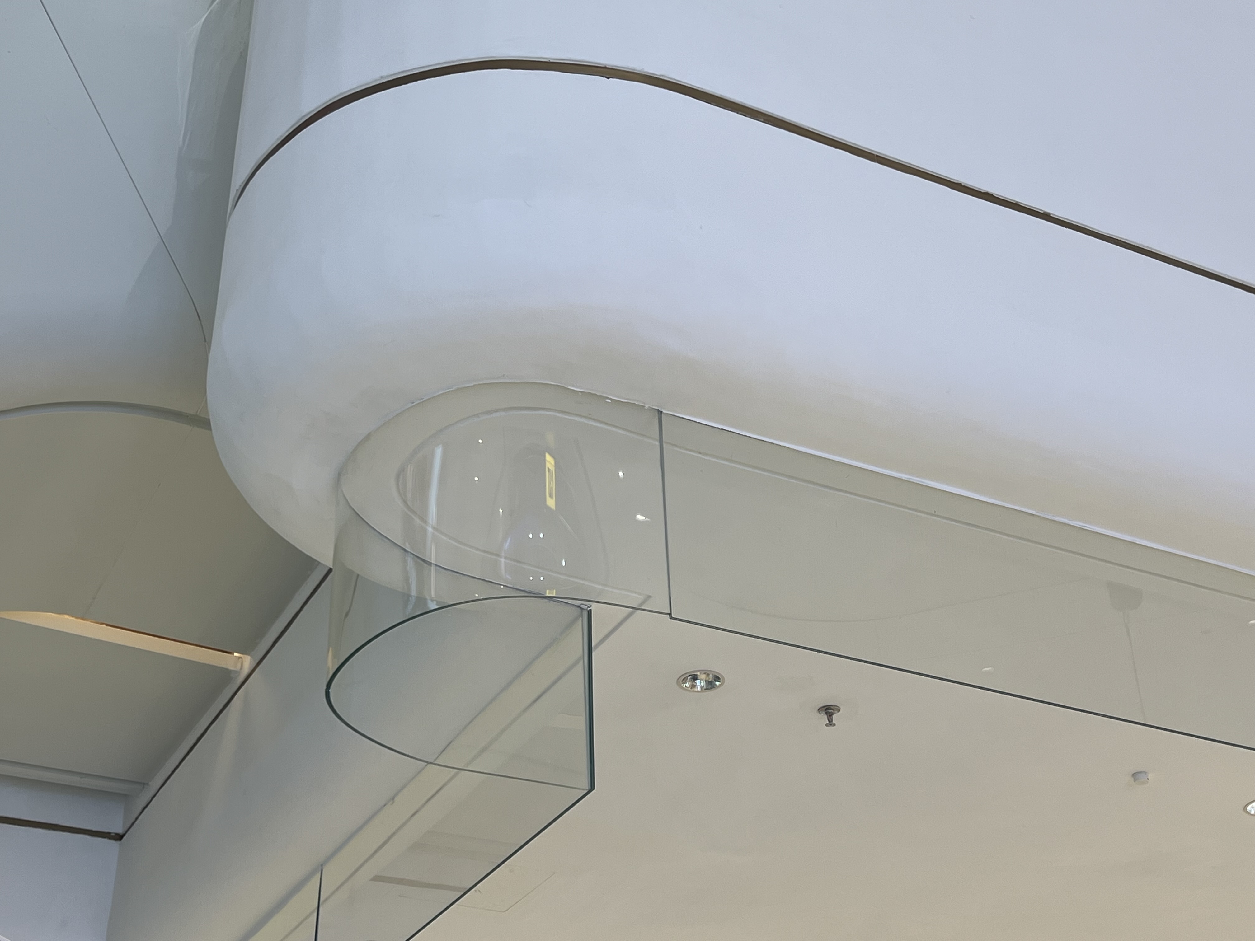 What Is The Vertical Glass Panel On The Ceiling Of The Shopping Mall?